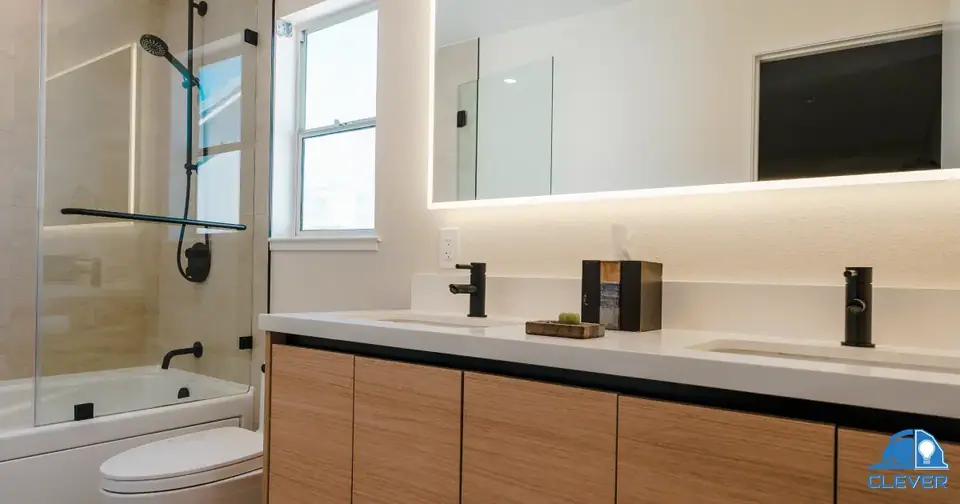 Neutral color palette and clean finishes in remodeled bathroom