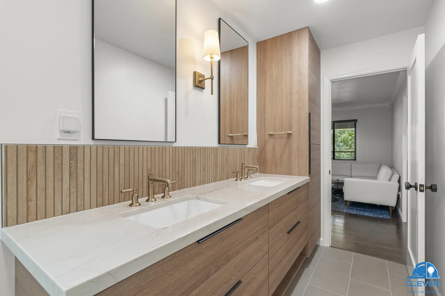 Walnut double vanity with brass faucets, a black-framed mirror and a tall walnut linen cabinet, kitchen and bath remodel in Los Gatos, CA